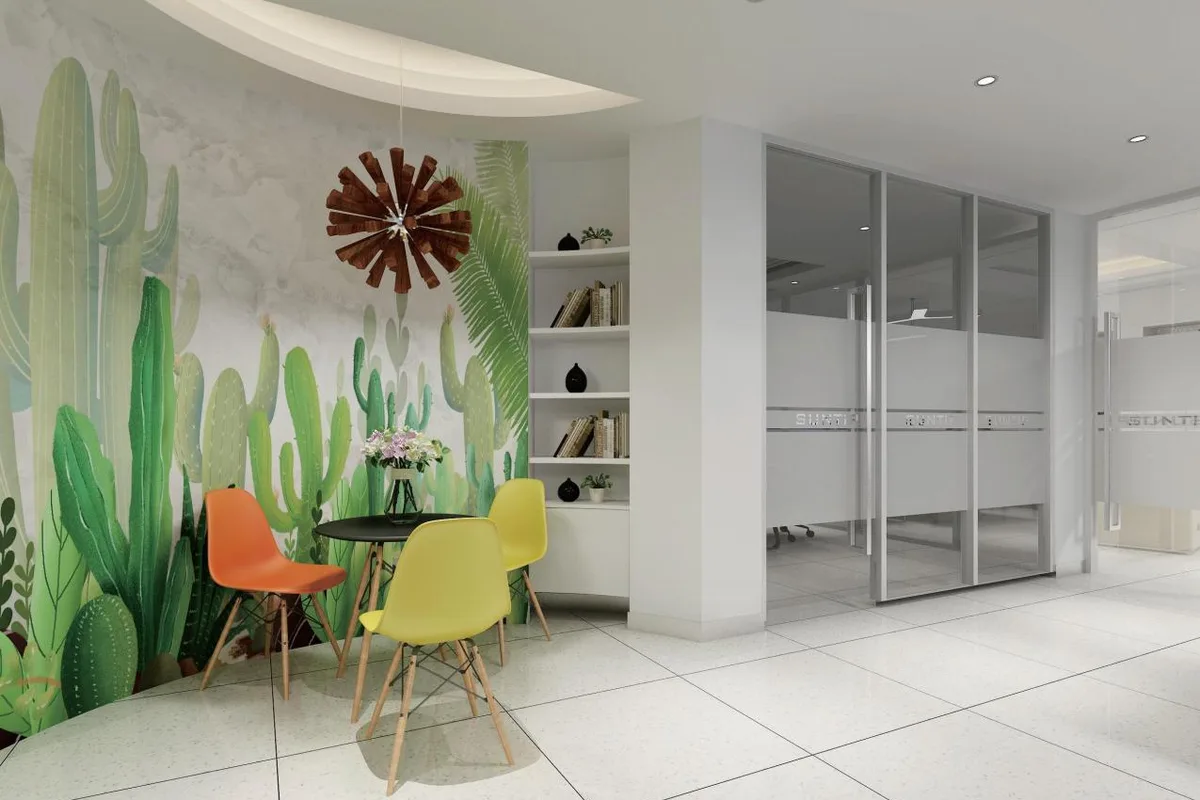 Printed acoustic wall with a cactus mural in a meeting area